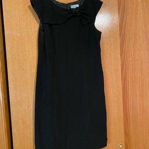 Great little black dress with beaded accent at neckline
